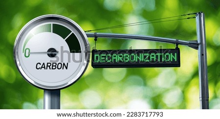 Gauge with inscription CARBON and sign board with text DECARBONIZATION. Concept of Carbon Neutrality Royalty-Free Stock Photo #2283717793