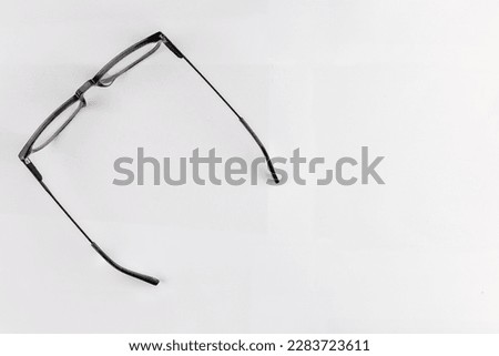Black Eyeglasses are Designed for Individuals with Visual Impairment for Enhancing Vision,Isolated on a White Background
