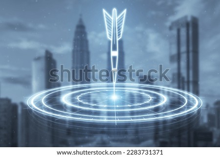 Digital bullseye aim with arrow hologram on blurry city wallpaper. Aiming, success and targeting concept. Double exposure
