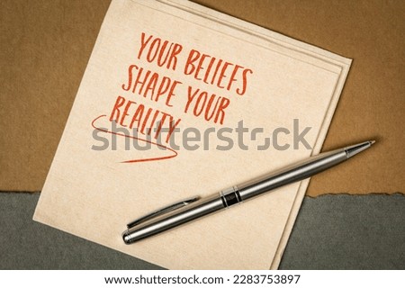Your beliefs shape your reality. Inspirational note or reminder on a napkin, Mindset and personal development concept. Royalty-Free Stock Photo #2283753897
