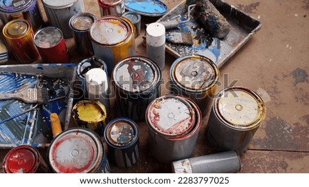 Old Paint Cans. Household hazardous waste HHW  Royalty-Free Stock Photo #2283797025