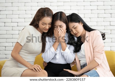 teenage problem about couple and not prevent or unprepared pregnant, friends console a with shirt lady with family problem, two volunteer try to comfort poor woman with her personal learning issue  Royalty-Free Stock Photo #2283809157