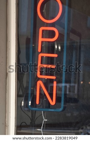Neon open sign in a window