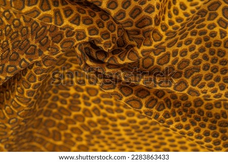 yellow-brown silk fabric, animal skin African theme. All projects are new and developed in our studio by designers with deep knowledge of fabric photography and the use of their final product.