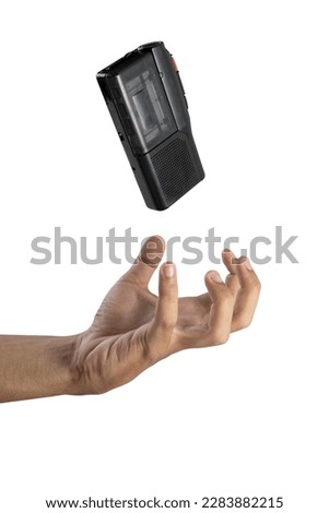 Human hand with recording device isolated over white background