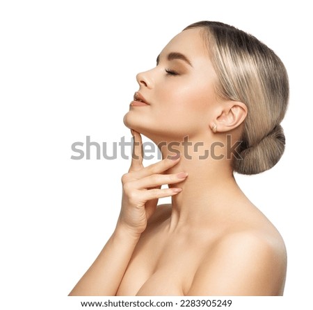 Woman Face Profile. Beautiful Girl Portrait Side view isolated White. Beauty Model pointing with Finger on Perfect Chin and Neck. Facial Lifting Massage and Plastic Surgery Concept Royalty-Free Stock Photo #2283905249