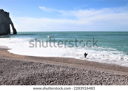 surfer on a coastline in France in spring 
