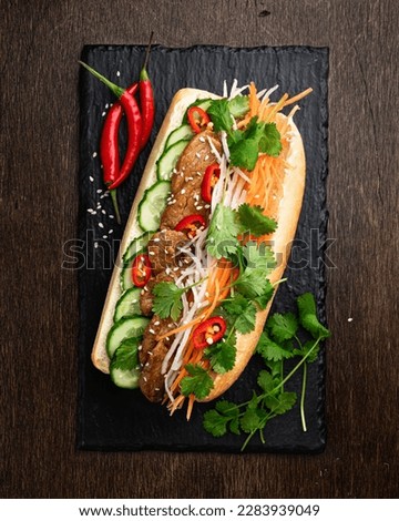 Sandwich Banh mi, vietnamese cuisine, top view Royalty-Free Stock Photo #2283939049