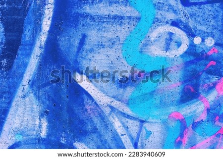 Closeup of colorful pink, purple, blue urban wall texture. Modern pattern for wallpaper design. Creative modern urban city background for advertising mockups. Grunge messy street style background Royalty-Free Stock Photo #2283940609
