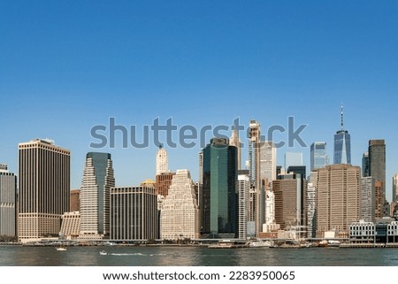 Glass towers of New York city on clear day. The United States of America. Concept of sightseeing and tourism. Downtown financial district