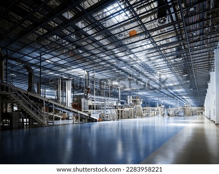 Large factory workshop space building Royalty-Free Stock Photo #2283958221