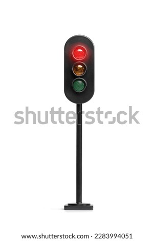 Studio shot of a traffic light with red light flashing isolated on white background
