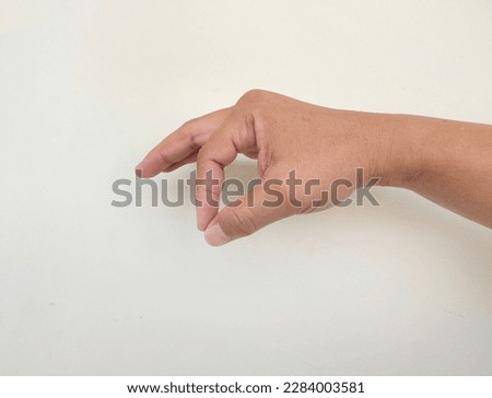 Close up of empty hand showing in various gestures, holding things, paper work, card, coin, bottle water, short fingers, small and large size, isolated on white background and practical concept.