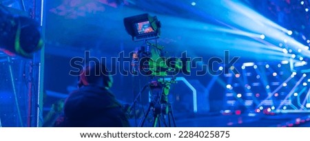 operator filming a concert for TV and the Internet Royalty-Free Stock Photo #2284025875