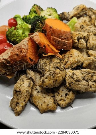 Pictures of grilled chicken with mix vegetables.