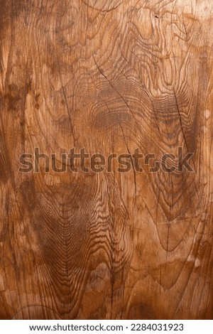 Brown wood texture. Wooden texture background. Vertical background