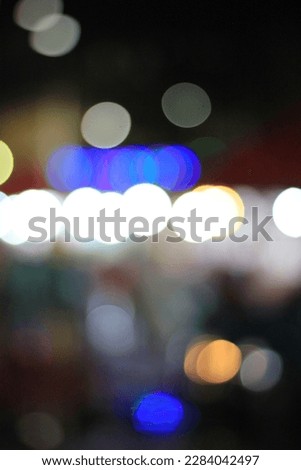 Awesome soft circle bokeh photo in the night, blurry background. Good for background.