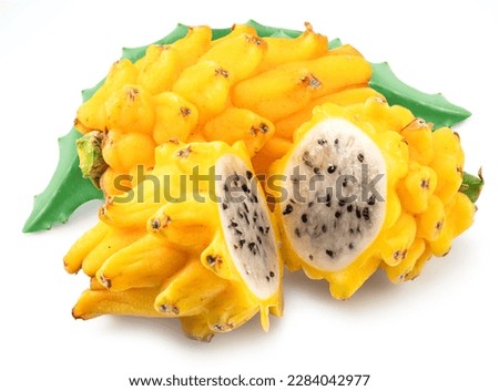 Yellow dragon fruit and dragon fruit slices isolated on white background.