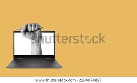 Art collage, hand from a notebook with a pen, journalist writing an article on a yellow background with room for advertising or text. The concept of working as a journalist. Royalty-Free Stock Photo #2284074829