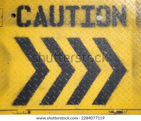industrial yellow metal caution sign