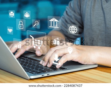 Online shopping and ecommerce technology concept. Selection of products in the basket online bank payment with secure internet technology on laptops