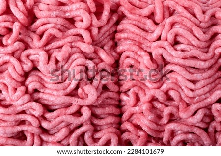 Meat mince with pork and beef mix. Food background. Full frame Royalty-Free Stock Photo #2284101679