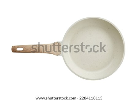 Ceramic frying pan isolated on white background. Studio shot Royalty-Free Stock Photo #2284118115