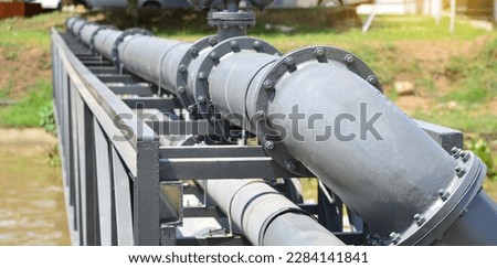 Water steel pipe close up image. Flange Pipe Fitting. Select focus of drink water piping. Royalty-Free Stock Photo #2284141841