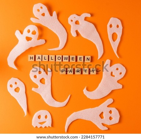 White ghosts craft for Halloween party. Paper ghost on orange background. Cartoon creepy Whisper. DIY hand made. Set boo characters. Word wooden letter phrase. Spooky halloween ghost