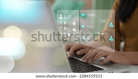 Businessman using laptop computer chatting with chat bot, Chat with AI or Artificial Intelligence technology. chatting communication. Customer using online service with chat bot .chat gpt Royalty-Free Stock Photo #2284159215