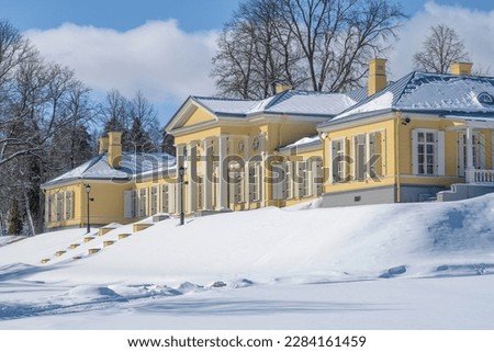The main building of the ancient estate of Mon Repos on a sunny March day. Vyborg. Leningrad region, Russia Royalty-Free Stock Photo #2284161459