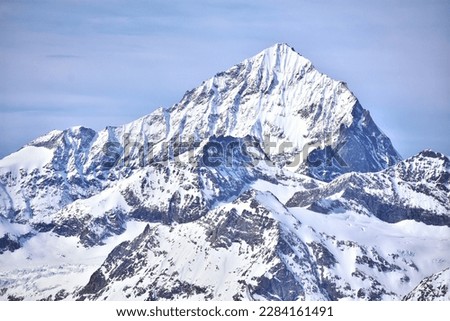 snowcapped mountain view in Switzerland  Royalty-Free Stock Photo #2284161491