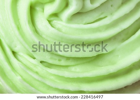 Close up of green icing on a cup cake