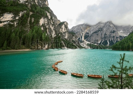 Lake Braies (Lago di Braies, Pragser Wildsee) in Dolomites Alps, South Tyrol. Best touristic place in Dolomites. Lake with typical rowing wooden boats. Royalty-Free Stock Photo #2284168559