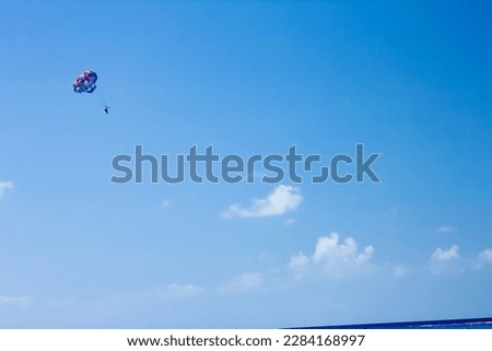 on the parachute by the sea in the open air
