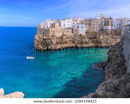 Polignano a Mare: Cala Monachile Beach in Italy (Apulia). It is located in the center of Polignano, a few steps away from the historic center. Royalty-Free Stock Photo #2284198423