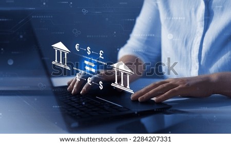 Money transfers from different currencies internationally and currency exchange. Online banking and interbank payment. Royalty-Free Stock Photo #2284207331