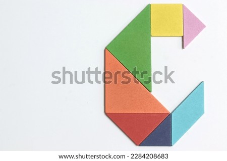 Color tangram puzzle in english alphabet C shape on white background