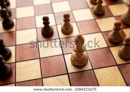 chess board. Chess set on the chess board. chess game pieces. Logical tactical turn based game, tournament, sport, game, hobby and interests, highly intellectual occupation. classical. wooden board.