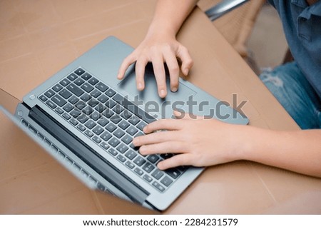 Close up image of man hands typing on laptop computer keyboard , online, technology, internet network communication concept