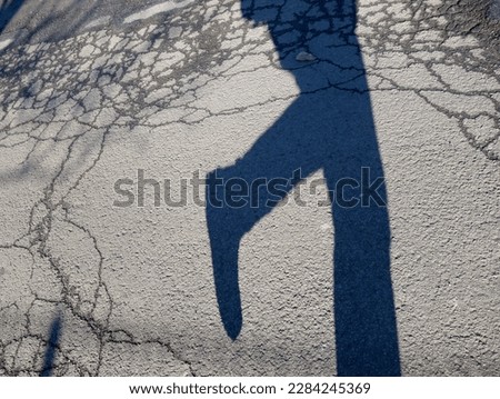 A shadow picture on a street in the city