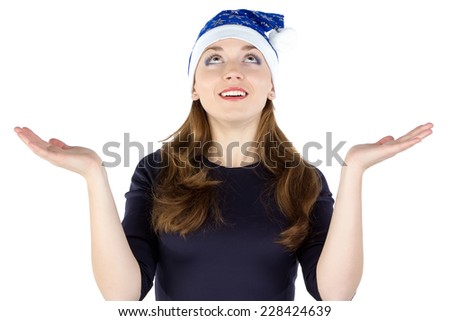 Portrait of young woman in joyful anticipation on white background
