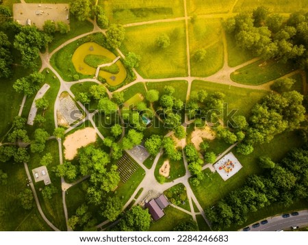 Aerial top view Public park in south part of Siauliai city with people enjoying leisure activities, Lithuania Royalty-Free Stock Photo #2284246683