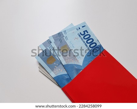 Rupiah money on a white background.