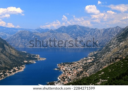 high mountains in Montenegro. Beautiful Kotor Bay and old city Kotor in summer. Full top view boka kotorska, Montenegro Royalty-Free Stock Photo #2284271599