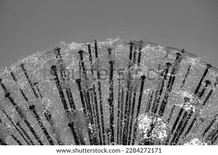 Close up of a modern fountain in black and white 