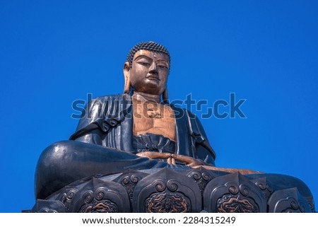 Landscape with Giant Buddha statue on the top of mount Fansipan, Sapa region, Lao Cai, Vietnam. Amitabha Buddha statue on top of Fansipan, the Roof of Indochina