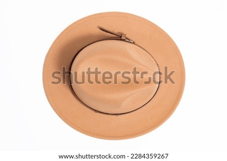 Top view stilish brown safari style hat for women, isolated white background. Royalty-Free Stock Photo #2284359267