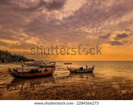Sunset on white wates beach, Rembang  Central Java Indonesia 
