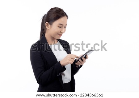 Portrait young asian businesswoman using smartphone isolated on white background, business woman standing and looking smart phone with confident, female using telephone, cut out, one person.